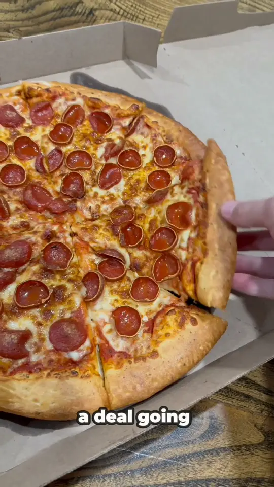 Topper's Brick Oven Pizza in Mulberry showing pizza, large 1-topping pizza, video by Toppers Pizza on Facebook