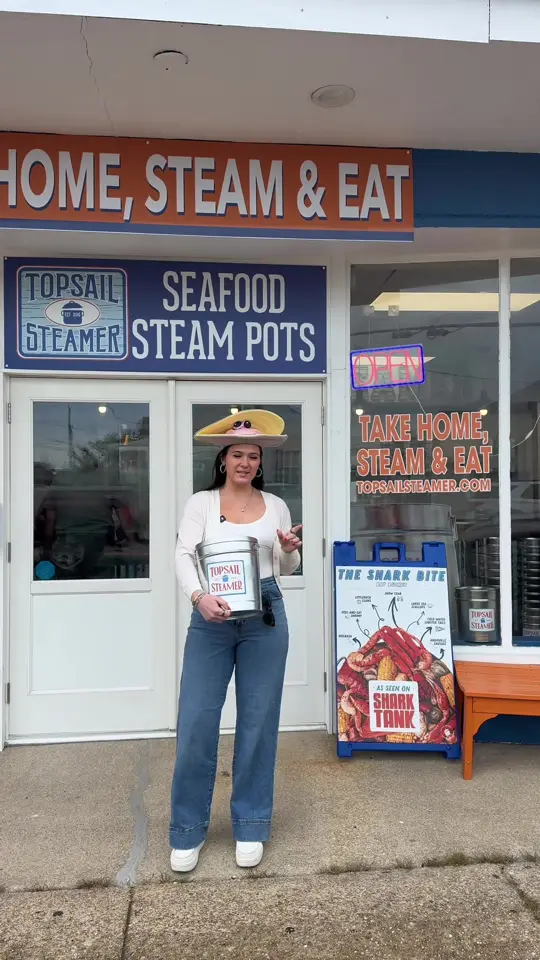 Topsail Steamer Seafood in Holmes Beach showing review, visit, seafood boil, shark bite bucket, video by wildwood.eats on TikTok