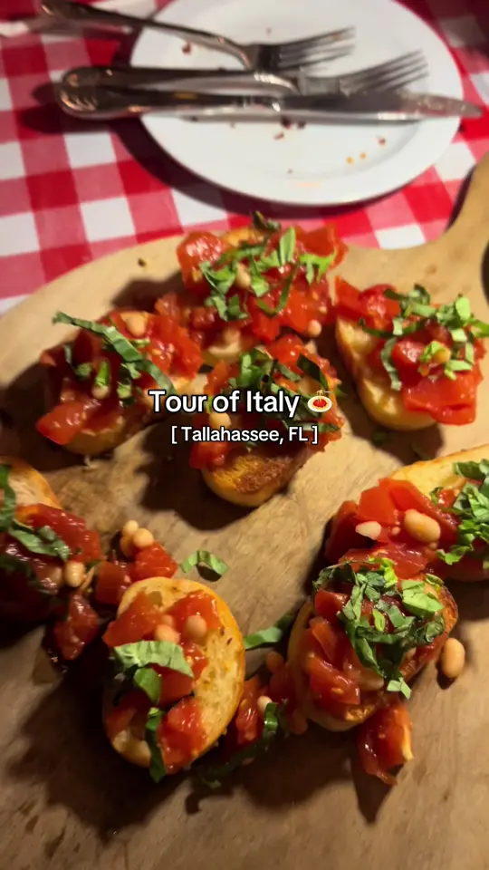 Tour of Italy in Tallahassee showing food review, appetizers, cheesy bread, bruschetta, video by amayapersephone on TikTok
