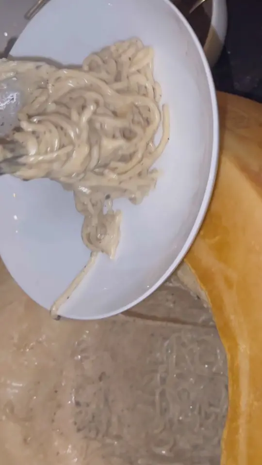 Tre Vele in Sandy Springs showing cheese wheel cacio e pepe, food review, video by lexiwiththecurls on TikTok