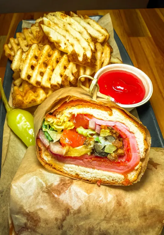 Treylor Park - Pizza Party in Savannah showing pizza, hoagies, video by treylorpark.restaurants on TikTok