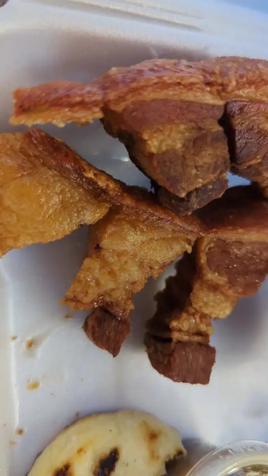 Trigos Colombian Restaurant in Lawrenceville showing food, colombian chicharron, video by random_rican on TikTok