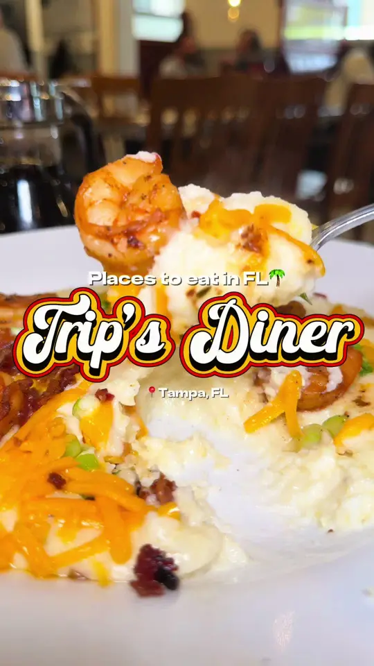 Trip's Diner in St. Petersburg showing breakfast, shrimp and grits, chicken and waffles, video by kaymarie023 on TikTok