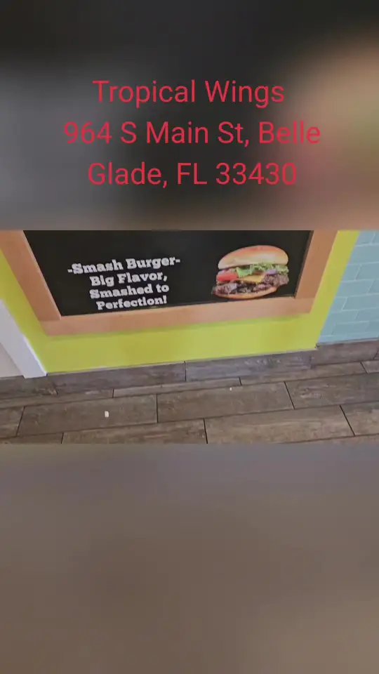 Tropical Wings in Belle Glade showing visit, chicken, video by ibethemagic on TikTok
