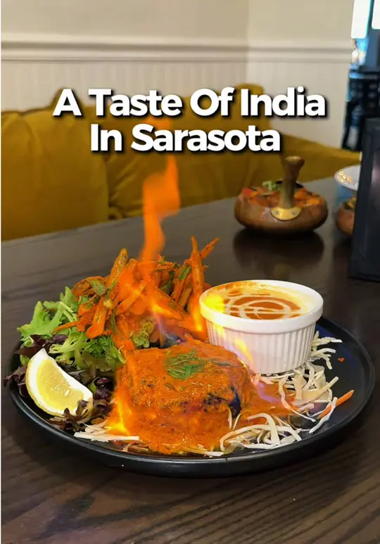 Turmeric Indian Bar & Grill in Sarasota showing food, chili paneer, sea bass tikka tandoori, kadai mushroom, video by eatlocalflorida on TikTok