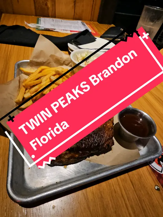Twin Peaks - Brandon in Brandon showing review, salty food, cold food, large portions, freezing cold atmosphere, chill open space, video by lacraigshollis on TikTok