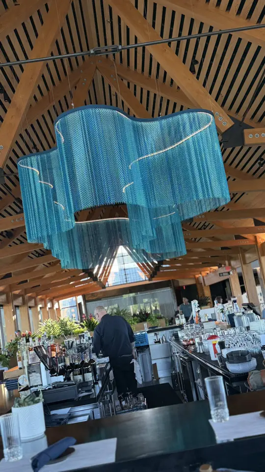 Twin View Restaurant at Evermore Resort in Orlando showing crab cake, fish crispy sandwich, video by amandabonsi on TikTok