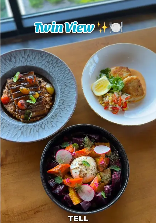 Twin View Restaurant at Evermore Resort in Orlando showing visit, review, food, magical dining, garden, video by foodie.girly on TikTok
