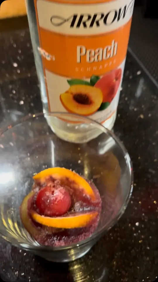 Umami Sushi Hibachi Restaurant and Bar in St. Petersburg showing cocktail, spiked red wine blossom, video by Umami Sushi Hibachi Saint Petersburg on Facebook