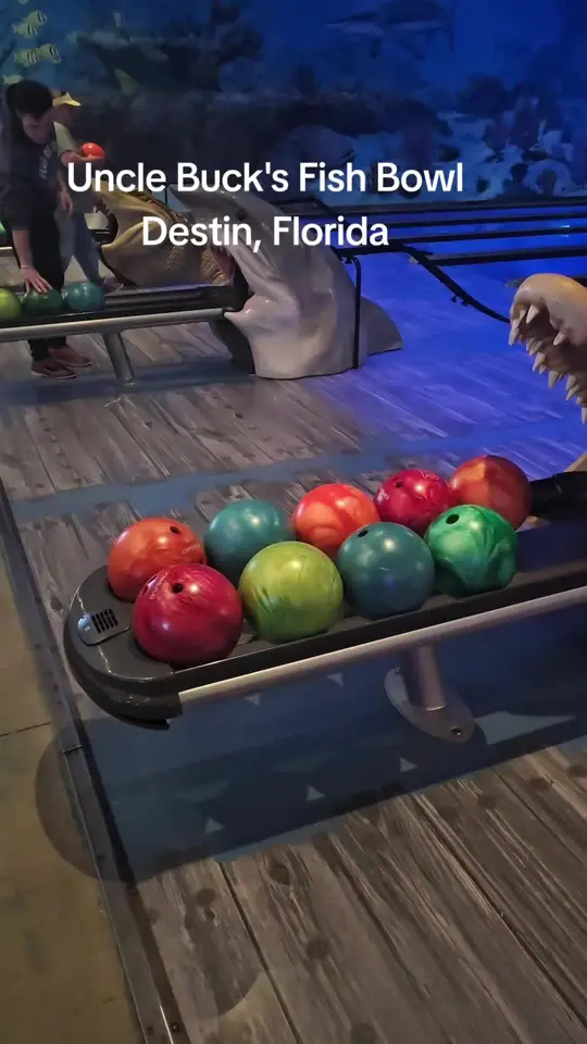 Uncle Buck's Fish Bowl and Grill in Destin showing bowling, dining experience, video by gulfcoastjourneys on TikTok