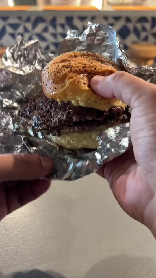 United States Burger Service in Miami showing review, visit, smash burgers, video by josiaheats on TikTok