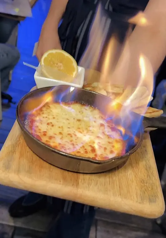 VAS Kouzina in Roswell showing review, true greek salad, mussels citrus ouzo, saganaki, lavraki whole fish, video by atlantabestbites on TikTok