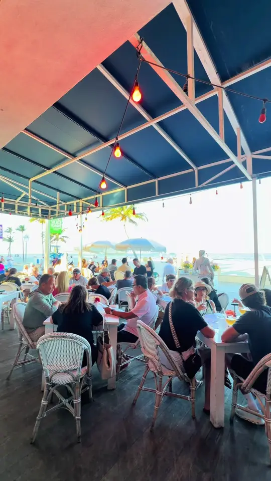Venice Restaurant in Hollywood showing seafood, ocean views, handcrafted cocktails, waterfront dining, video by venicehollywoodfl on TikTok