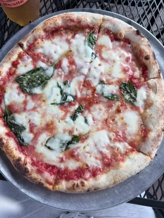 Vesuvio Pizzeria Napoletana Kennesaw in Kennesaw showing restaurant visit, pizza, margherita pizza, peach iced tea, atmosphere, video by juleslove13 on TikTok