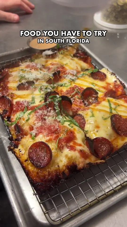 Vice City Pizza- Kendall in Miami showing pizza, video by josiaheats on TikTok