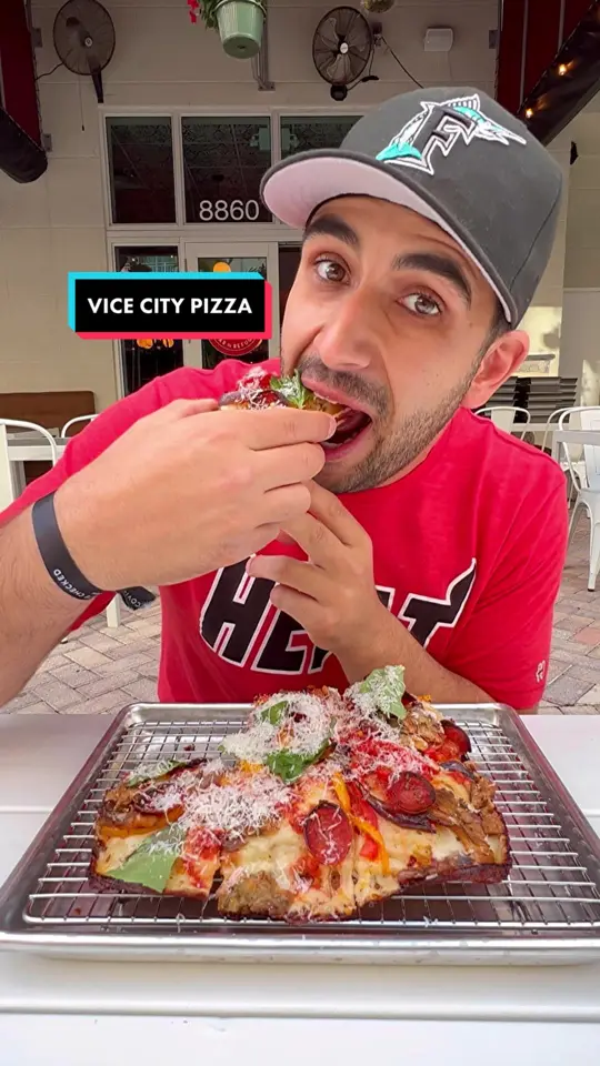 Vice City Pizza- Kendall in Miami showing pizza, national pizza day celebration, video by mr.eats305 on TikTok