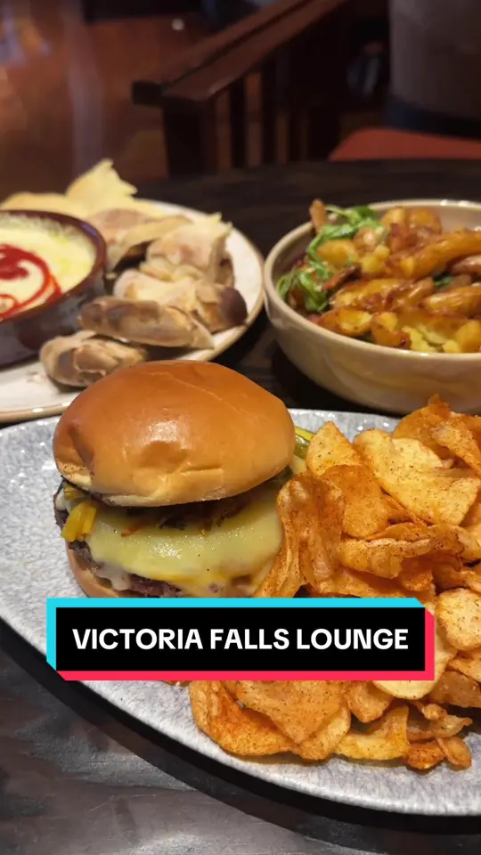 Victoria Falls Lounge in Lake Buena Vista showing lounge, goat cheese dip, drinks, video by wrightdownmainstreet on TikTok