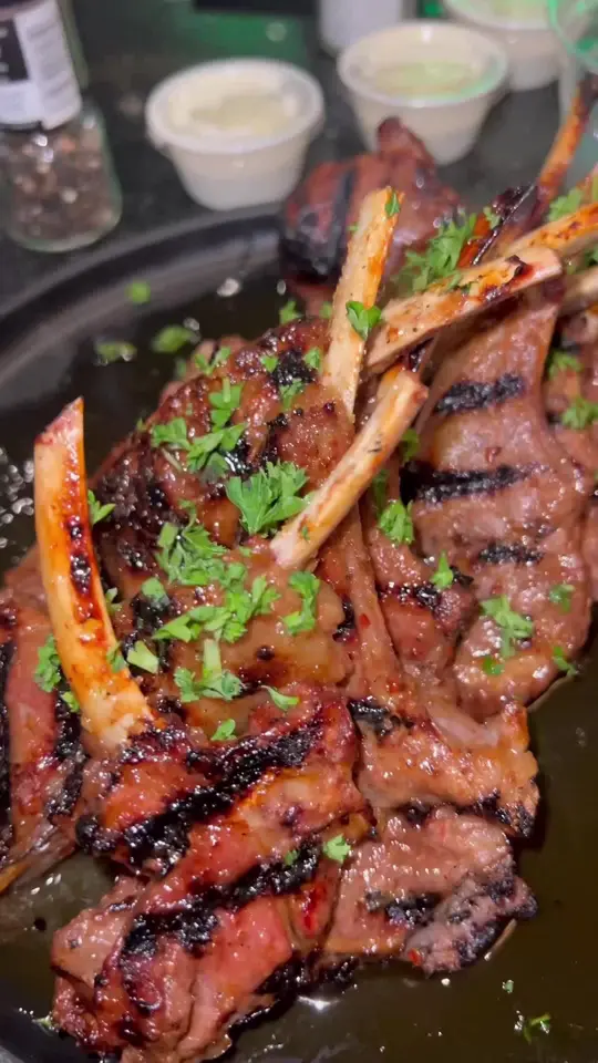 Views Bar and Grill Atlanta in Atlanta showing food, $2 lamb-chop tuesdays, video by vibesinatl on TikTok