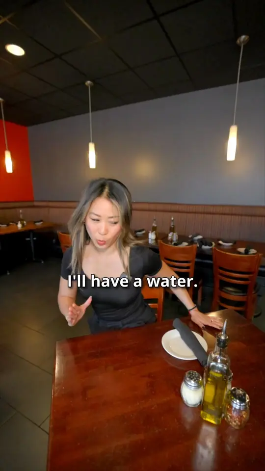 Vignetos Italian Grill in Plantation showing drinks, water, video by Vignetos Plantation on Facebook