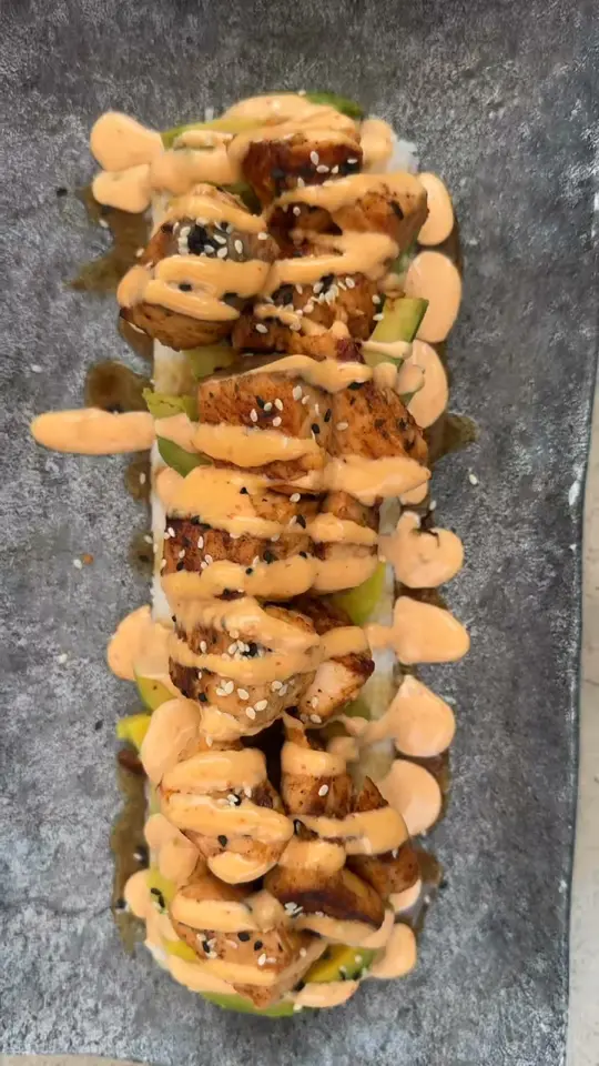 Village Brewhouse in Punta Gorda showing food, salmon avocado stack, video by Village Brewhouse on Facebook
