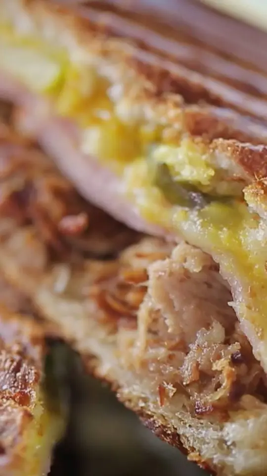 Vinny's in Miami showing food, cuban sandwich, video by Food Network on Facebook