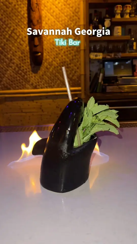 Water Witch Tiki in Savannah showing cocktail, tiki bar atmosphere, video by Blessings in Savannah on Facebook