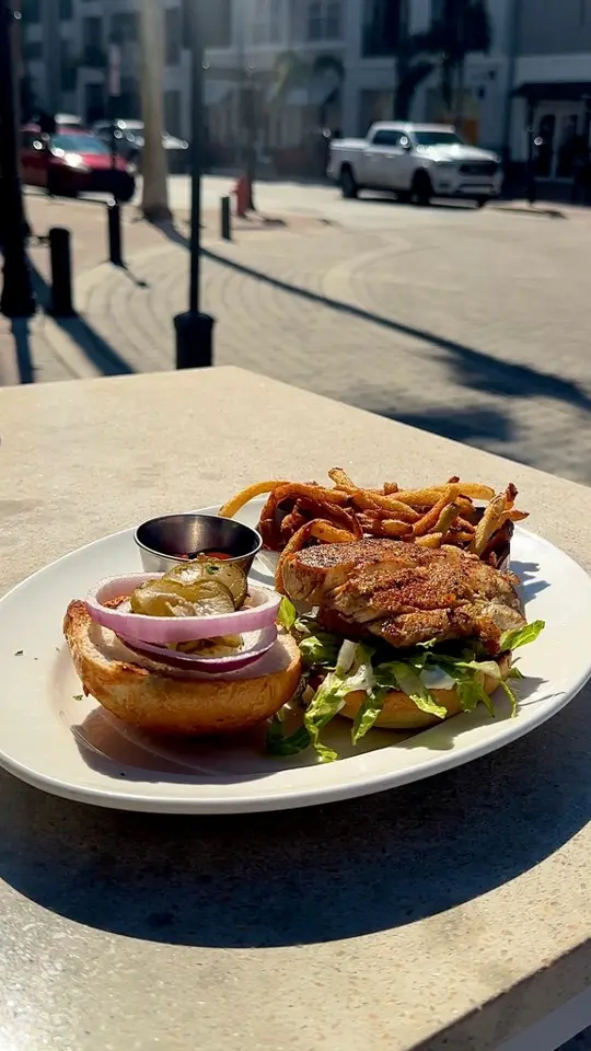  in Florida showing food, grouper tacos / food, burgers / drinks, cold drink / atmosphere, stunning views of tampa bay, video by Visit Tampa Bay on Facebook