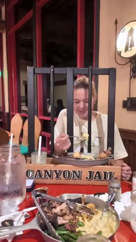 Whispering Canyon Cafe in Lake Buena Vista showing dinner, family-style skillets, singing, dancing, shenanigans, video by Megan Moves on Facebook
