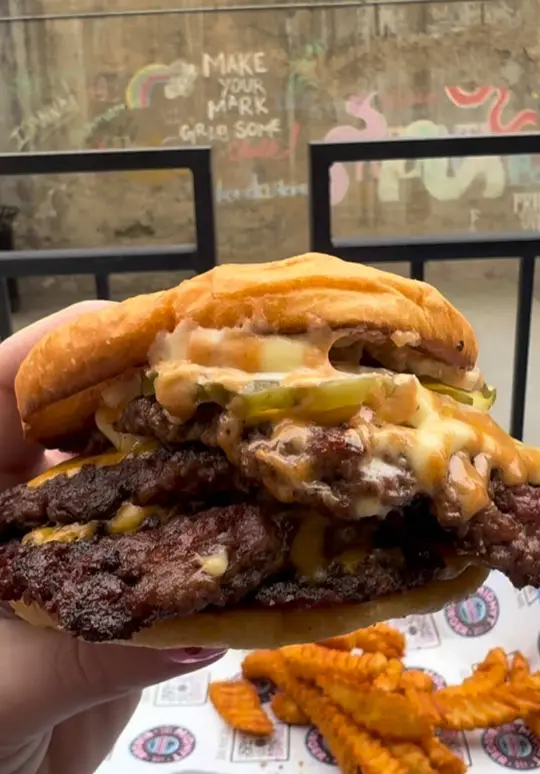 Wild Leap Atlanta in Atlanta showing smash burgers, seasoned crinkle cut fries, fried oreos, slushee flight, atl utd soccer games, video by jessfindsfun on TikTok