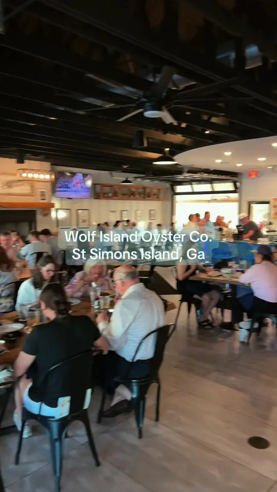 Wolf Island Oyster Co. in St Simons Island showing visit, atmosphere, video by wolfislandssi on TikTok
