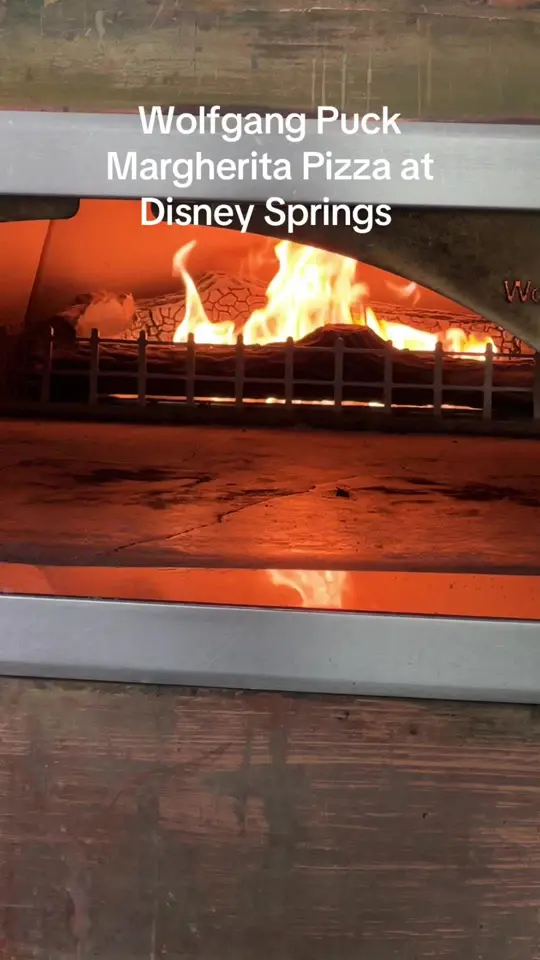 Wolfgang Puck Bar & Grill in Lake Buena Vista showing pizza, margherita pizza, video by visitorlando on TikTok