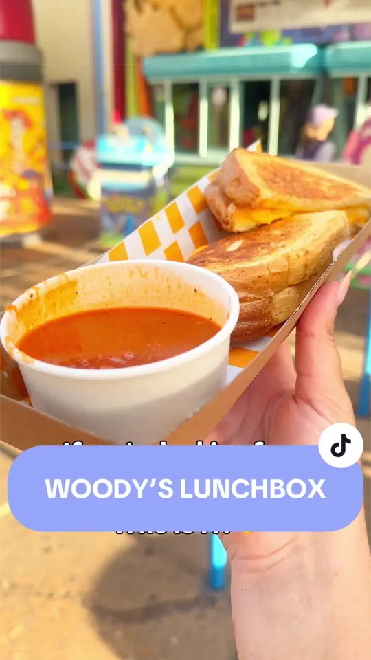 Woody's Lunch Box in Orlando showing food, grilled three-cheese sandwich, tomato-basil soup, video by disneyfoodblog on TikTok