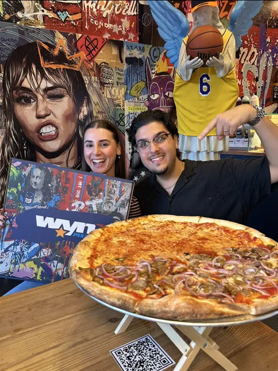 WYN Pizza in Miami showing pizza, visit, video by crisandnatcaptures on TikTok
