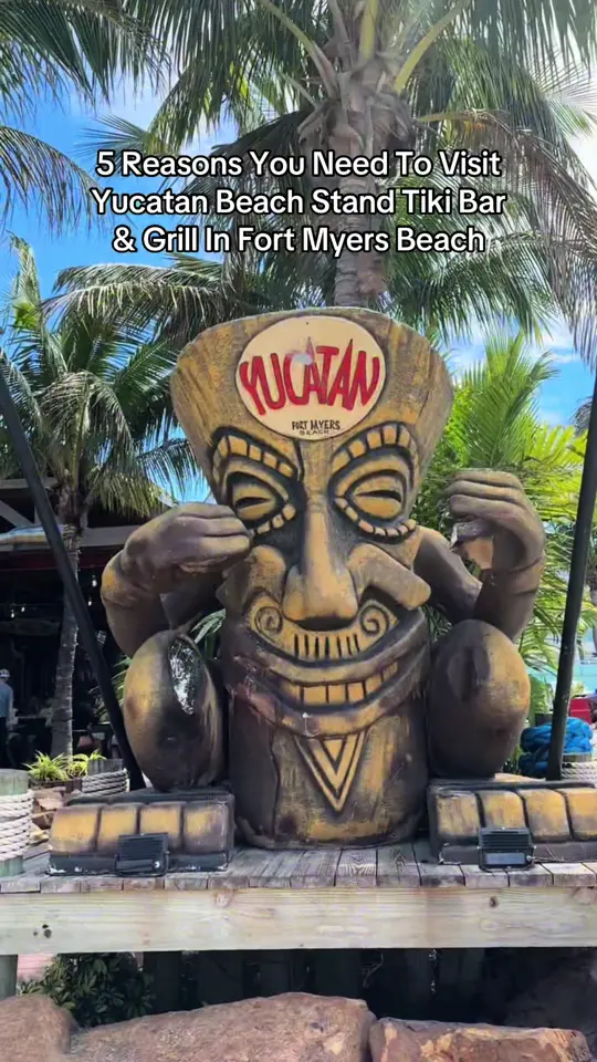 Yucatan Beach Stand Tiki Bar & Grill in Fort Myers Beach showing beachfront dining, tropical drinks, live music, fresh seafood, swing bar, video by traveldoublesedu on TikTok