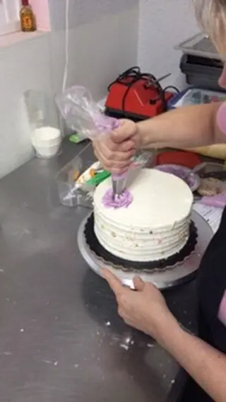 Zoe's Sweet Kitchen in Port Charlotte showing custom cakes, birthday cake, wedding cake, shower cake, anniversary cake, video by Zoe’s Sweet Kitchen on Facebook