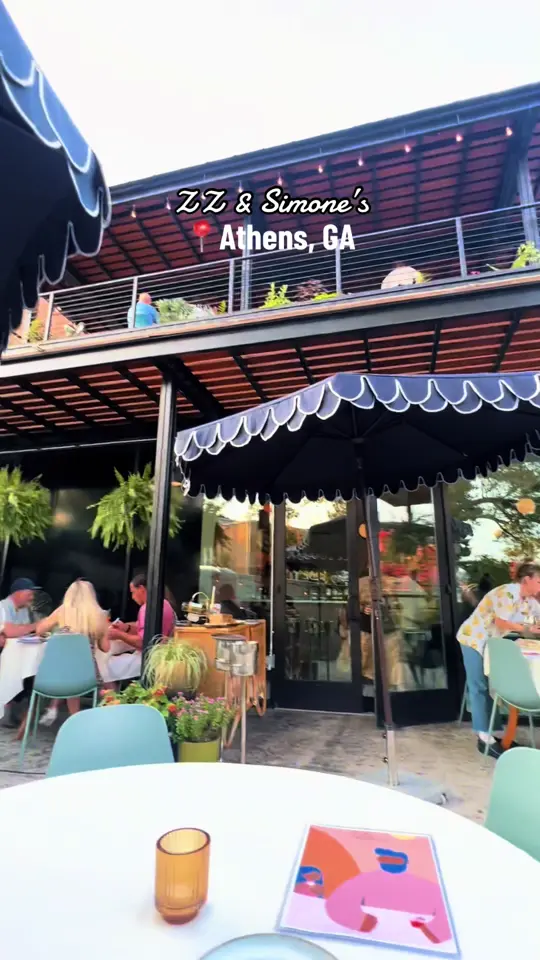 ZZ & Simone's in Athens showing pizza, spicy sausage ‘za, lemon ‘za; salad, caesar salad; bread, warm focaccia | whipped ricotta; drink, classic spritz; dessert, cheesecake, video by emventuring on TikTok
